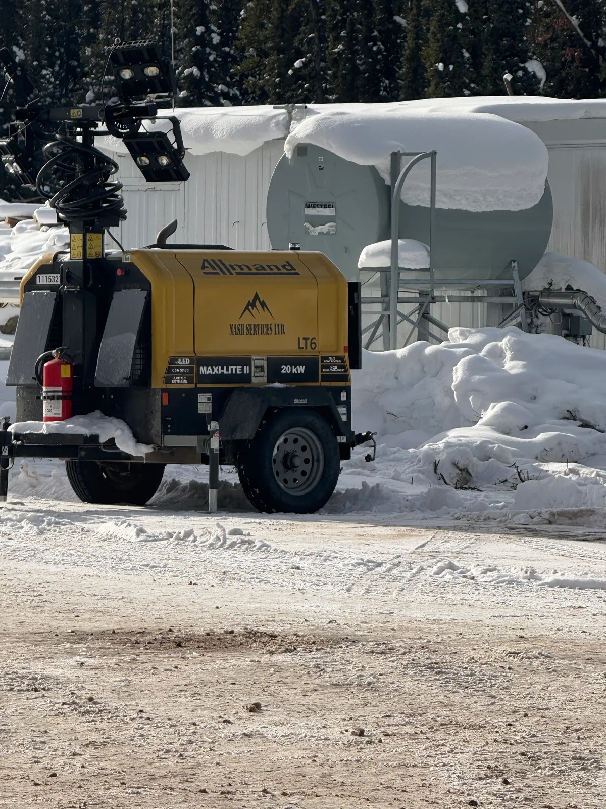 Nash Services 20kW Allmand LED light tower on a snowy lease site